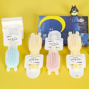 Cepillo de pelo con cojín de aire para niñas pequeñas, peine pequeño portátil con mango de plástico para PC, nuevo peine de masaje iónico de Color caramelo para uso doméstico - Product Image 1