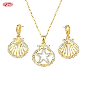 Parures de bijoux fantaisie Hengdian plaqué or 18 carats avec coquillages et étoiles de mer, zircon AAA, vente en gros pour femmes – Idéales pour l'été, la plage et les rendez-vous - Product Image 1