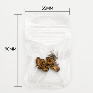 Strass pour nail art K9 de haute qualité Paso Sico Melanoiding ; Nouveaux strass tendance jaune fumé en forme d'œuf et de cœur incliné pour ongles - Product Image 5
