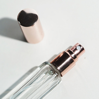 Nouvel atomiseur de parfum à l'huile vide de luxe en gros bouteille de parfum en verre transparent rechargeable de 10ml avec paquet de boîte de papier de pulvérisation