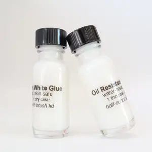 Penggunaan Salon Profesional 0.5 OZ Per Botol Perekat Tahan Air Kuat Lem Putih Tahan Minyak Profesional untuk Wig Toupee