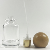 Flacon de parfum en verre personnalisé de luxe 30 ml, emballage cosmétique transparent, cylindre en verre vide avec pompe et boîte