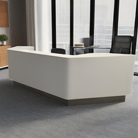 Bureau de réception moderne et durable à surface solide incurvée et élégante en Corian Bureau de réception d'angle