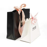Oem personnalisé imprimé Logo luxe Pr cosmétique produits de maquillage Shopping emballage cadeau sac en papier avec poignée pour maquillage beauté boutique