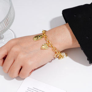 2025 joyería femenina pulsera <span class=keywords><strong>de</strong></span> dijes pequeños pulsera <span class=keywords><strong>de</strong></span> oro <span class=keywords><strong>de</strong></span> 18 quilates con forma <span class=keywords><strong>de</strong></span> corazón <span class=keywords><strong>de</strong></span> amor con hoja <span class=keywords><strong>de</strong></span> clavo <span class=keywords><strong>de</strong></span> mar <span class=keywords><strong>de</strong></span> circón - Product Image 2