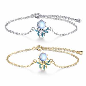 Bracelet en Zircon Blanc Plaqué Platine avec Breloque Pieuvre et Pierre de Lune, Micro-incrusté de Zircons, Bijou Femme en Forme d'Animal Marin - Product Image 1