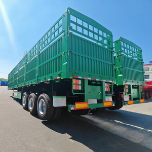 Semirremolque de 3 ejes y 50 toneladas con estacas de acero y paredes laterales de rejilla para transporte de construcción y alimentos en el puerto de Argelia - Product Image 4