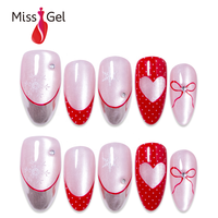 Ongles Press-On Magnétiques Rose Style Noël Effet Œil de Chat 32 Pièces Longs Amande Argent Cœur Nœud Français Ongles Artificiels Tendance