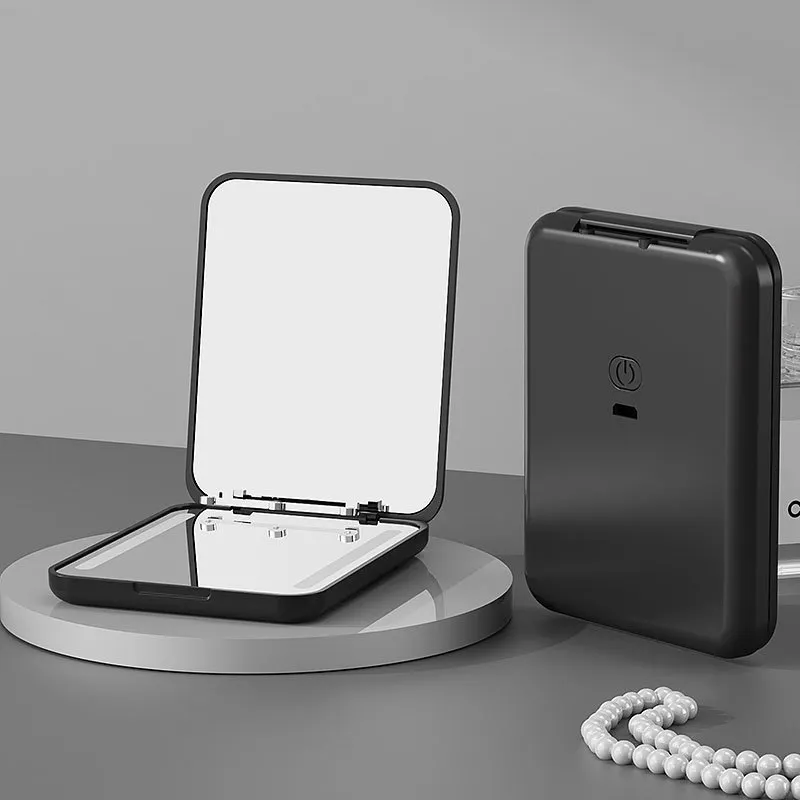 2024 Nieuwe Oplaadbare Usb Compacte Draagbare Zak Make-Up Spiegels Reizen Led Licht Opvouwbaar Handheld Kleine Mini Spiegel