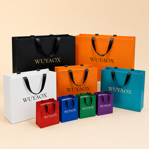 Bolsa de papel blanca al por mayor, personalizada con logotipo de marca, diseño promocional, de lujo, para regalo, compras, ropa y calzado. - Product Image 1