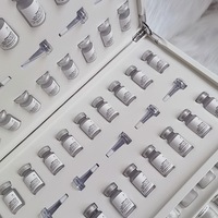 Boîte en carton recyclé avec impression personnalisée du logo et insert en EVA pour l'emballage de flacons d'huile essentielle, d'ampoules et de produits de soin de la peau