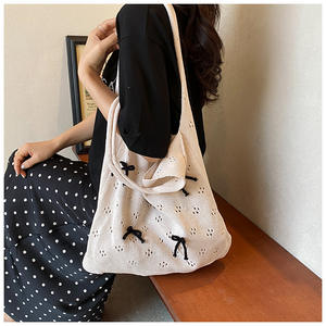 กระเป๋าถือถักกลวงสีเบจสไตล์สดใสและน่ารัก - Product Image 1