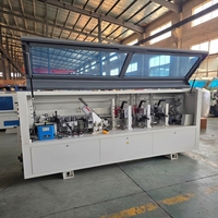 Machine à bordurer automatique CNC RG550S pour la fabrication de portes d'armoires, machine à bordurer pour le bois, les meubles et les panneaux de fibres.