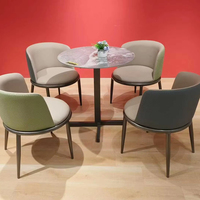 Chaise de salle à manger moderne en flanelle à structure métallique avec siège en MDF confortable pour bureau à domicile et banquet d'hôtel pour le salon