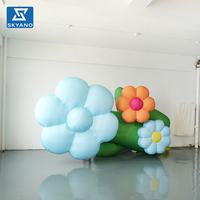 Modèle gonflable personnalisé en forme de fleur bleue pour événements extérieurs, publicité et décoration