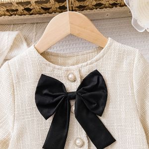 Ensemble de vêtements pour petite fille, style européen, écologique, respirant, printemps-été, cardigan à nœud, jupe plissée, tricot en coton, 3-8 ans - Product Image 5