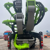 Pompe à béton d'occasion Zoomlion 63m à flèche 7 sections, châssis diesel Benz, Euro 5, 2020, faible nombre d'heures de fonctionnement, entièrement révisée, fiable