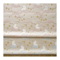 Nouveau et tendance : Tissu jacquard brodé 100 % polyester avec fil doré, motif lapin en satin, pour vêtements et sacs pour enfants