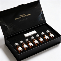 Boîte cadeau rigide noire sur mesure avec fermeture magnétique, logo estampé à chaud or, insert en mousse EVA pour 9 bouteilles de boisson au collagène et peptides.