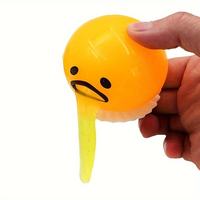 Vente en gros : Jouets anti-stress à presser unisexes, amusants et tendance, jouets sensoriels œuf jaune, pendentif farceur œuf paresseux jaune à sucer et vomir