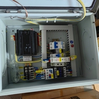 Boîtier de distribution JXK sur mesure 220V, indice de protection IP54, 32A, avec verrouillage hybride, panneau d'automatisation PLC marque Chengcheng, interface de démarrage-arrêt