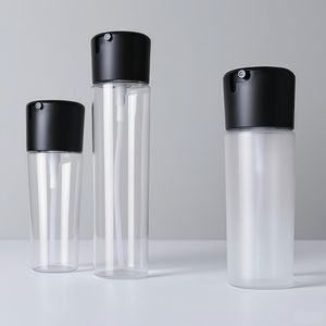 Vente en gros de flacons pulvérisateurs ronds en PET transparent de 50 ml et 100 ml, tête de pompe en plastique noir, impression d'écran, <span class=keywords><strong>produit</strong></span> pour le visage, bouchon à vis, étanchéité - Product Image 4