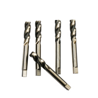 Taraud à cannelures spirales pour opérations de filetage en atelier et taraudage de trous aveugles lors de la production de pièces métalliques