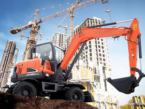 Develon DX60W Excavatrice sur pneus 6 tonnes Moteur Yanmar 40,8 kW Godet 0,18 m³ Pneus en caoutchouc hydrauliques mobiles Offre spéciale 2026 - Product Image 2