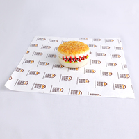 Feuilles de papier ciré d'emballage anti-graisse imprimées de logo personnalisé de qualité alimentaire pour sandwich à hamburger frites beignets de poulet