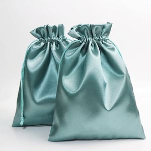 Bolsas de Embalaje para Pelucas al por Mayor, Bolsa de Satén de Lujo con Cordón y Logotipo Metálico Dorado para Ropa - Product Image 1
