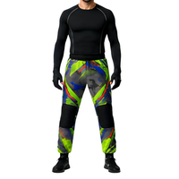Pantalon de paintball personnalisé imprimé numériquement avec genouillères rembourrées, motif vert vif et bleu noir, joggers décontractés d'extérieur
