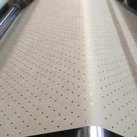 Precio de fábrica barato Kraft perforado Underlay papel círculo y triángulo agujero papel especial para ropa para fábricas de prendas de vestir