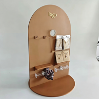Support de présentation d'accessoires pour boucles d'oreilles en acrylique personnalisé avec plusieurs étagères et base ronde pour comptoir de magasin de détail