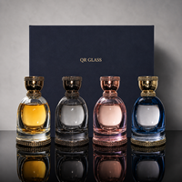 Flacons de parfum ronds en verre de luxe avec couvercle rond transparent doré 100 ml avec tête de pulvérisation à pompe avec boîte d'emballage