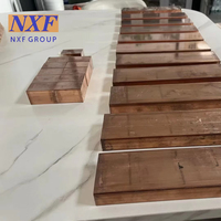 Barre de barre plate en cuivre T2 de taille personnalisée NXF ASTM B280EN12735/JISH3300 Bloc Cuivre Cube Électrode Plaque Pliage Soudage