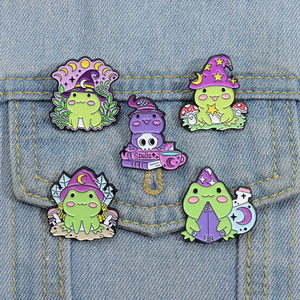 Broches de esmalte de rana bruja, insignias de animales de dibujos animados, regalo para niños y amigos, para ropa, estrella, luna, sombrero, joyería linda de rana - Product Image 1