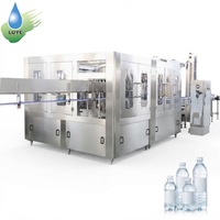 Machine de remplissage d'eau pure minérale 15000 BPH, usine complète d'embouteillage et d'étiquetage de bouteilles PET de 300 ml à 2000 L