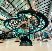 Conception et fabrication d'aires de jeux intérieures commerciales clés en main pour centres commerciaux avec grand toboggan en spirale