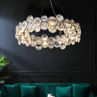 Lustre rond en métal européen personnalisé postmoderne, luminaires en cristal, lustres de luxe pour la décoration d'éclairage