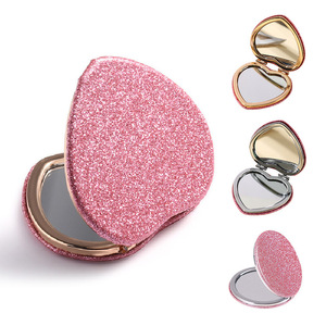 Wholesale Double Sided Folding Mini <b>Vanity</b> <b>Mirrors</b> Heart Shape Small Hand <b>Makeup</b> Pocket <b>Mirror</b> - Product Image 1