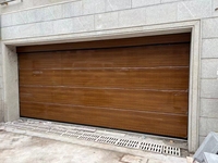 Porte de garage sectionnelle automatique en acier de style moderne, coupe-vent, antivol, surface finie ouverte et roulante pour usage domestique