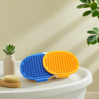 Brosse de massage pour animaux de compagnie en TPR avec bande réglable pour le bain, le toilettage et l'élimination des poils des chiens et des chats