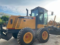 Niveleuse d'occasion GR2153 215 CV avec ripper, 16,5 tonnes, boîte de vitesses contrôlée par PLC et moteur Cummins – Machine de construction routière