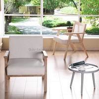 Meubles de maison chaise au design moderne avec assise souple pour salon et hôtel chaise canapé en bois massif avec tissu