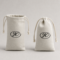 Vente en gros Sac en lin pour téléphone portable avec cordon de serrage Pochette en grains de café en jute avec logo personnalisé 10*21cm de couleur naturelle