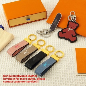 Mới Đến Thiết Kế Thời Trang Kim Loại Túi Mặt Dây Chuyền Hot Bán Loạt Vòng Chìa Khóa Với Khóa Thương Mại Nước Ngoài Thương Hiệu Đồ Trang Sức Keychain - Product Image 1