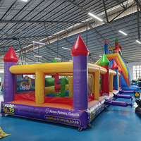 Aire de jeux gonflable géante commerciale avec toboggan et château gonflable pour la location d'événements d'été en plein air
