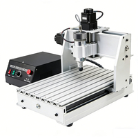 Machine de gravure CNC 2 en 1 3040 avec changeur d'outils rotatif pour travaux d'art métallique DIY