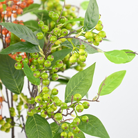 Vente en gros de branches de fruits sauvages artificiels en PE de taille moyenne avec feuilles vertes pour la décoration intérieure, les accessoires de photographie et l'affichage en cuisine