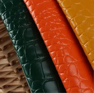 Tissu en cuir artificiel de PVC de grain de pierre de crocodile de Faux cuir d'impression animale colorée pour des sacs à main, bijoux, couverture, pantalon de la dame